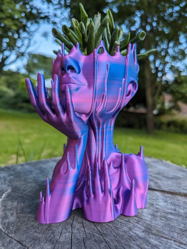 Head planter melted - planter,,